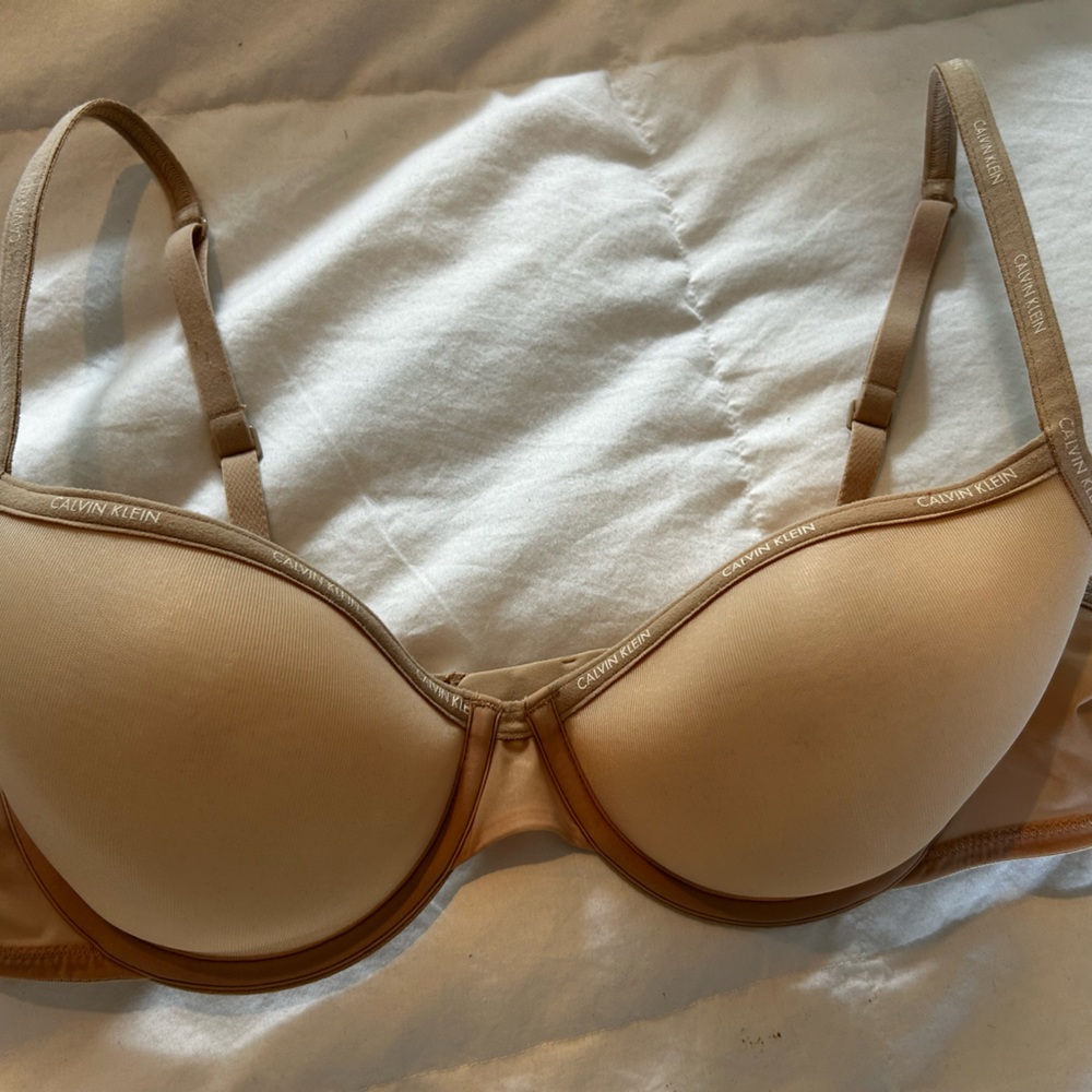 2 for 1-item. Calvin Klein-Sheer Lightly Lined Demi Bra 36B excellent condition.
